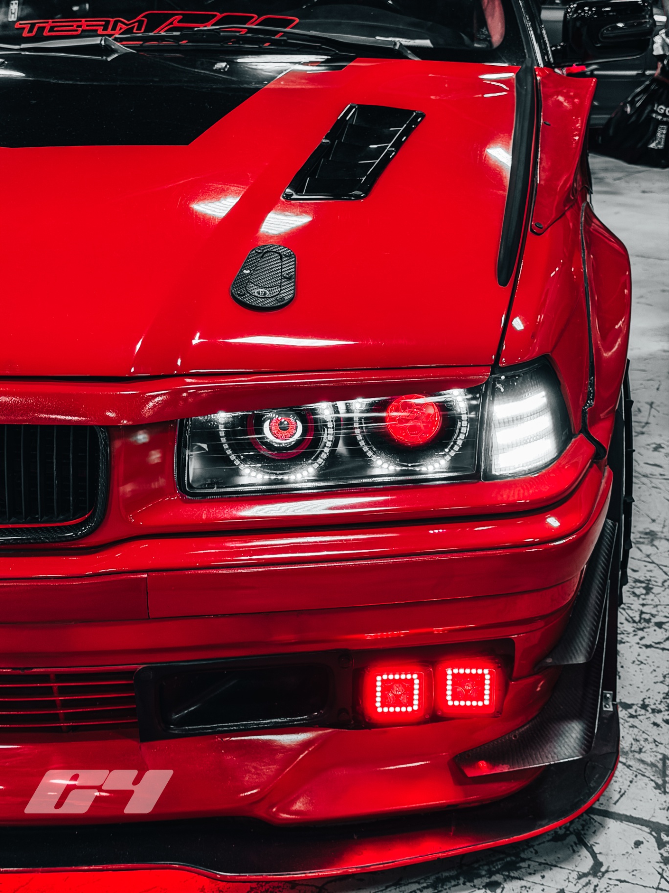 Headlight and hood vent close-up